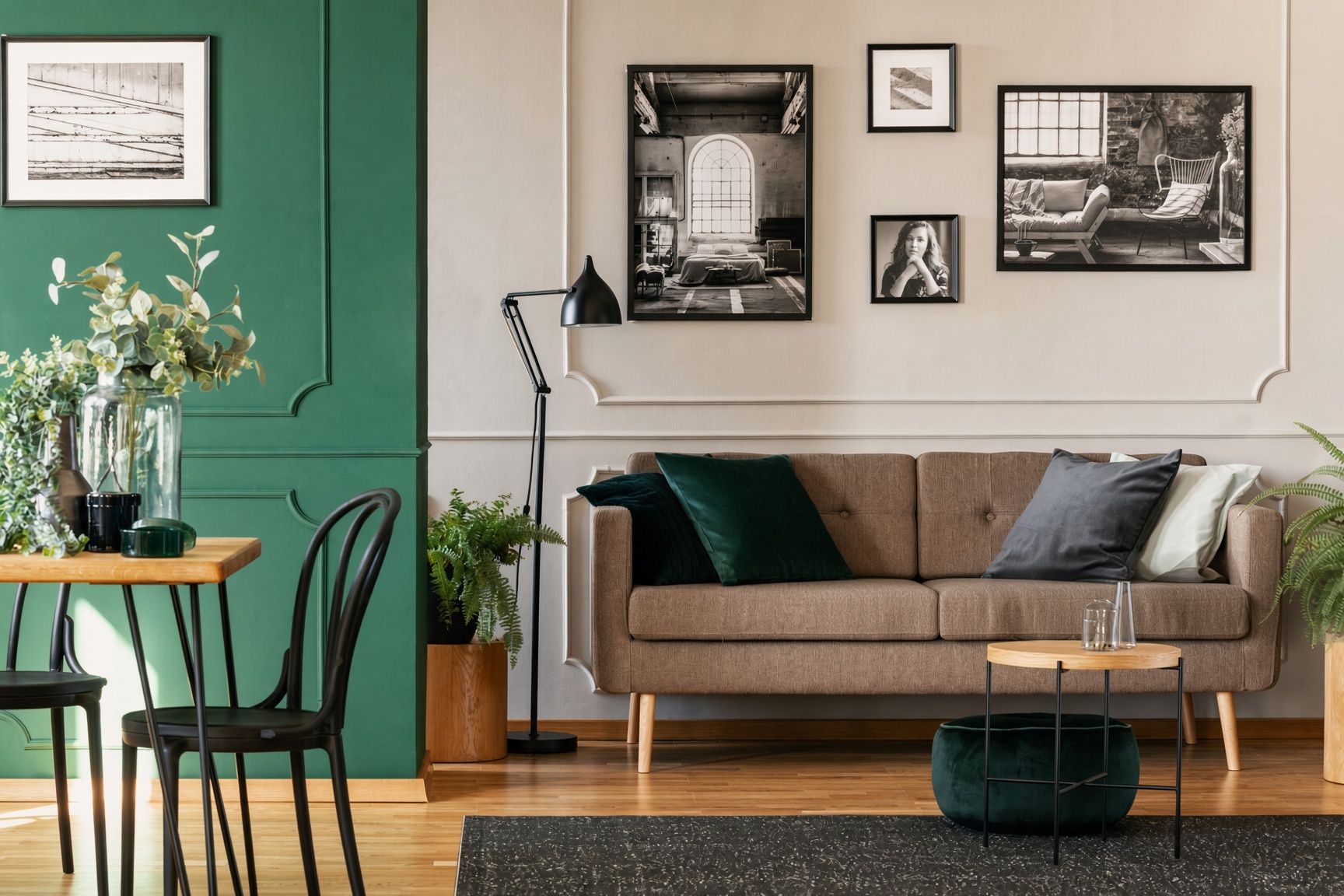 Freshly painted hallway with a deep green dado and off-white walls above.